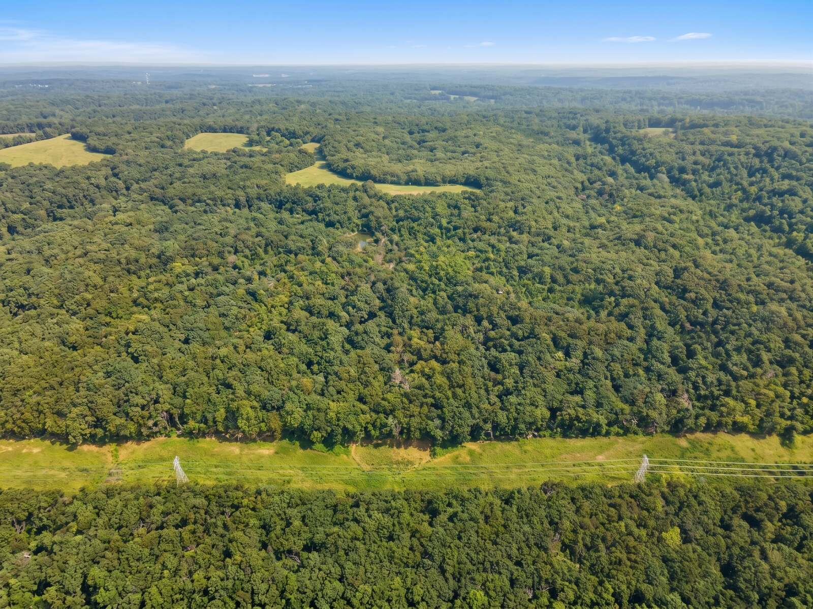 Aerial view over the timbered ridgetop at Gobblers Knob near Pacific, Missouri